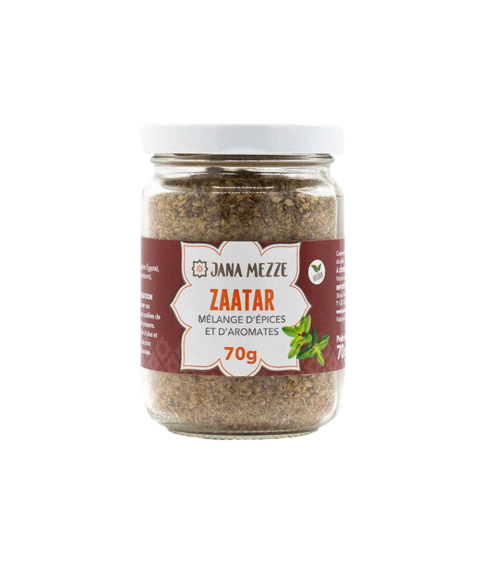 A jar of Jana Mezze Zaatar, a traditional Lebanese spice mix, with a label indicating 70g weight and the spices listed in French.